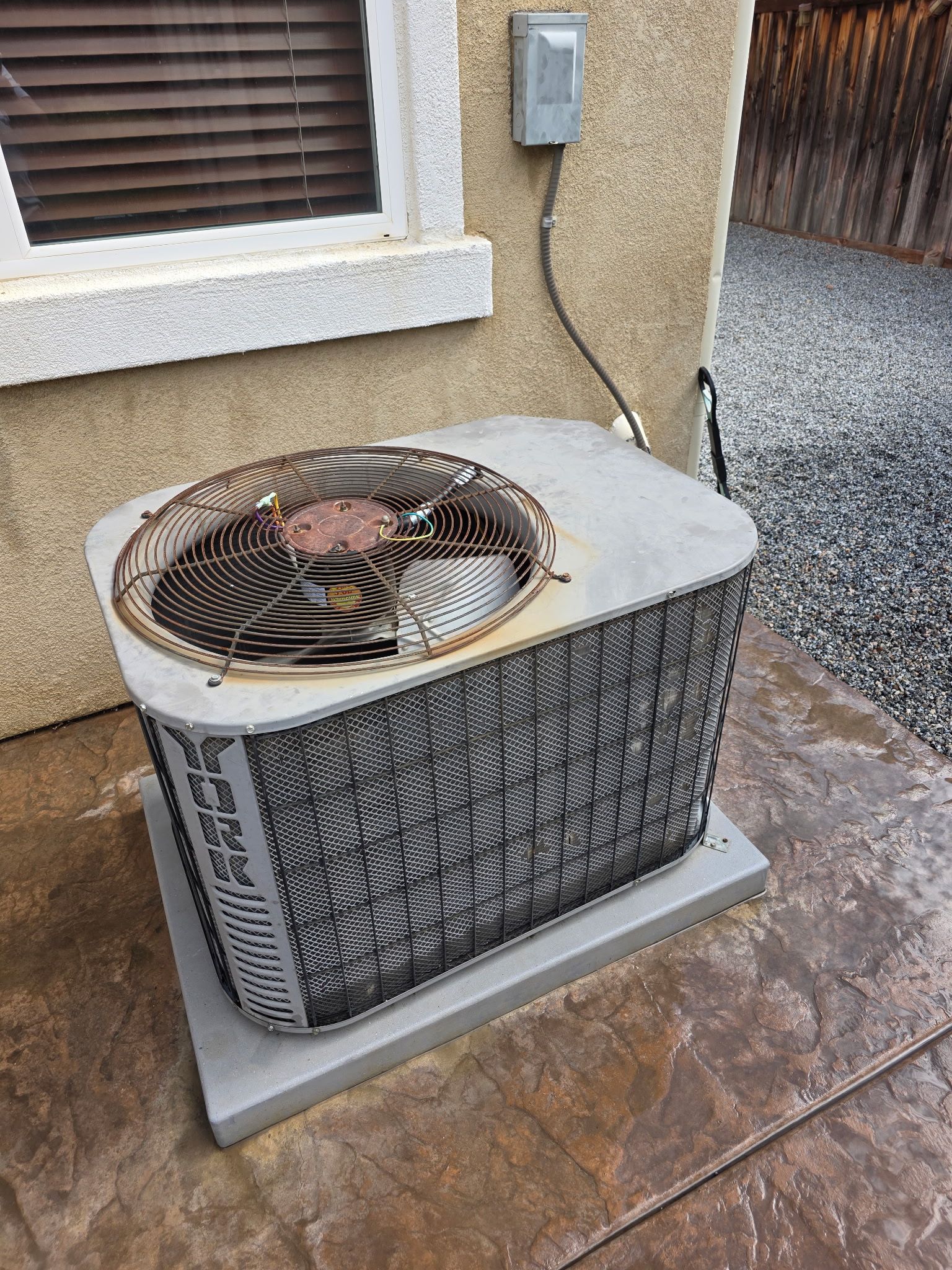 Outdoor air conditioning equipment at a residential property.